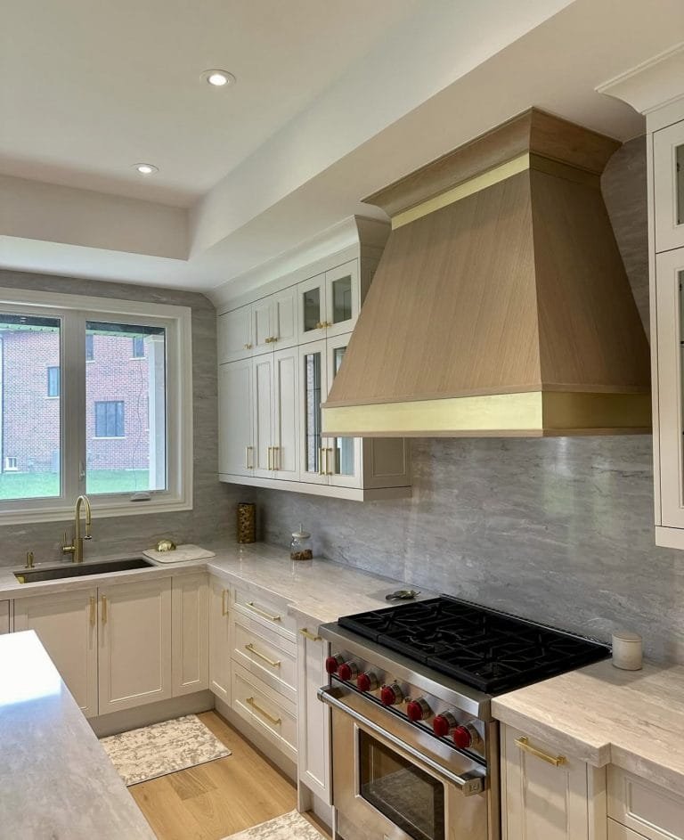 10 Kitchen Cabinet Ideas That Elevate Quiet Luxury in Modern Homes Brass Range Hood